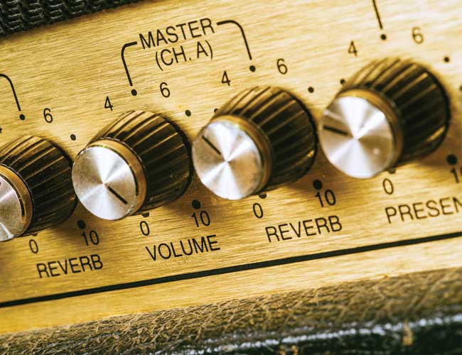 Control Knobs on an Electric Guitar Amp